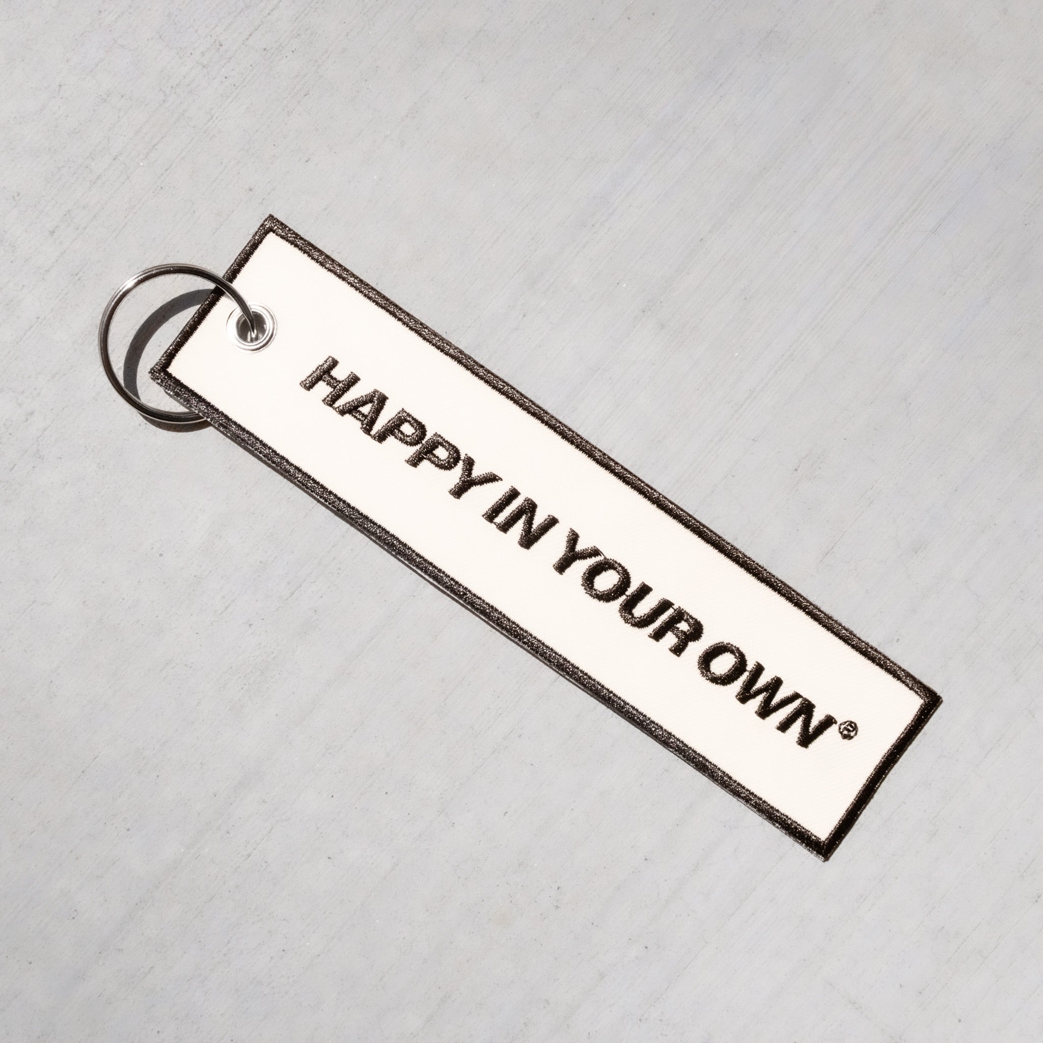 happy in your own keychain