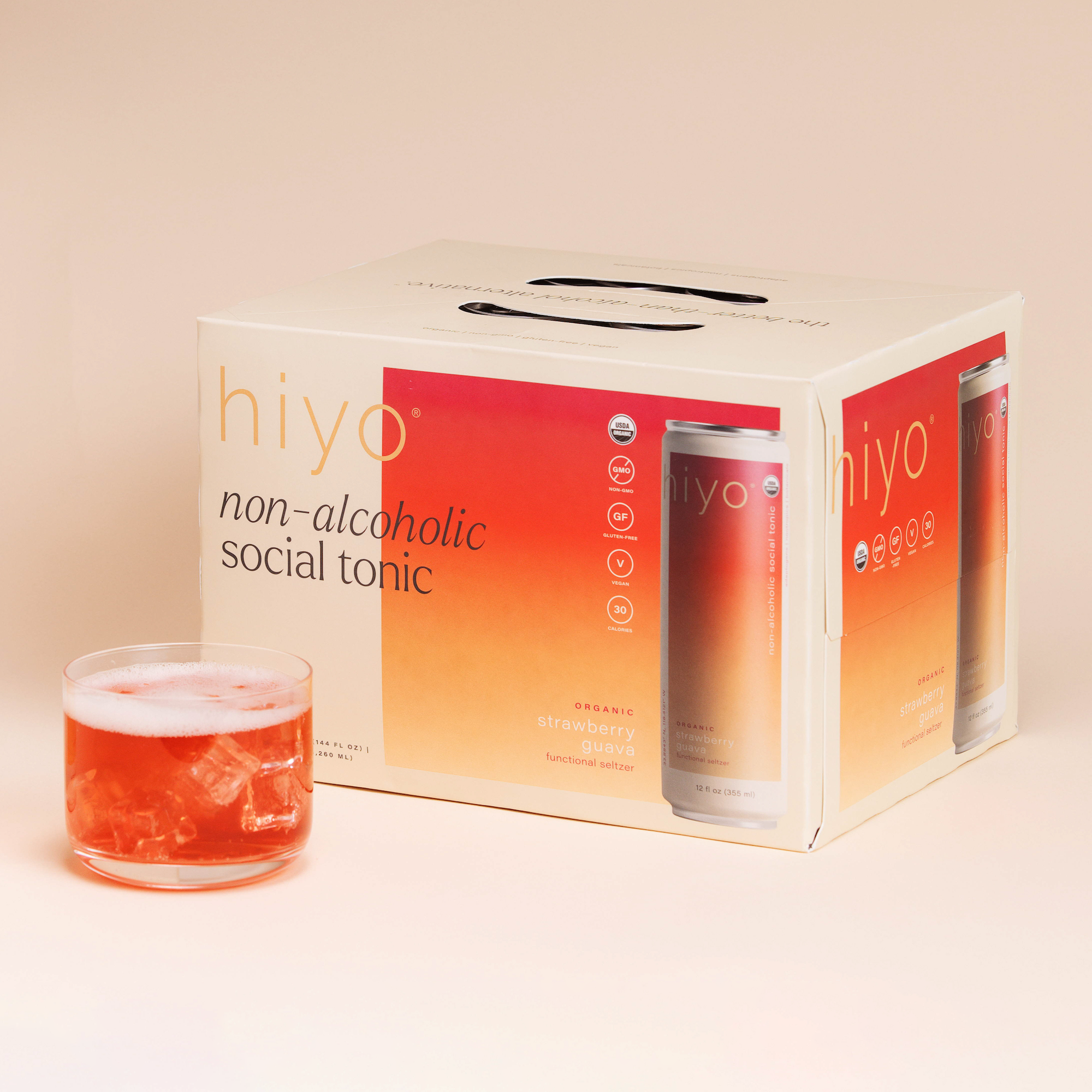 hiyo's strawberry guava flavor. image includes the 12-pack box and a fizzy, iced glass of the beverage.